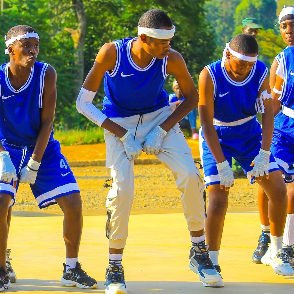 Modern dancers in matching outfits for a performance